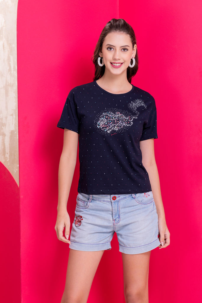 A woman wearing a round neck ,relaxed fit printed cotton top in navy Color