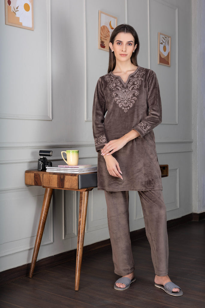 A woman wearing a full sleeve, relaxed fit, Velvet Co-Ord set with V-neck and floral embroidery in Mouse Brown Color 